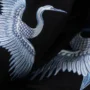 Motif de grues japonaises, signature artistique de la marque OSAR