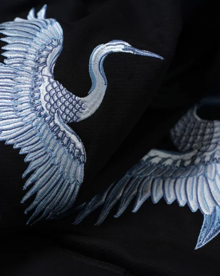 Motif de grues japonaises, signature artistique de la marque OSAR